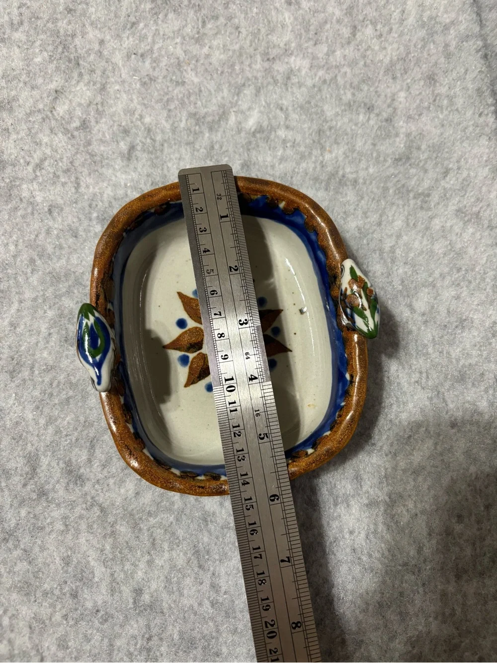 Mexican pottery dish oval ceramic with sun, floral & bird design